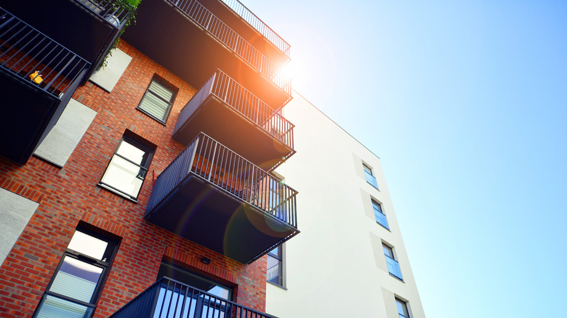 Modern,multifamily,building,in,a,european,city.,walls,made,of